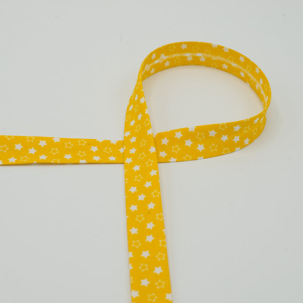 Biais étoiles jaune 18 mm - La boite à tissus
